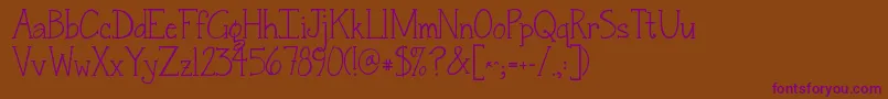 Jandasnickerdoodleserif-fontti – violetit fontit ruskealla taustalla