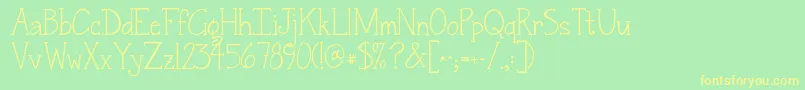 Шрифт Jandasnickerdoodleserif – жёлтые шрифты на зелёном фоне