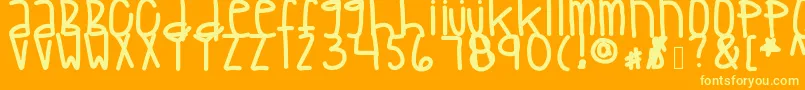 Clippersbaby-Schriftart – Gelbe Schriften auf orangefarbenem Hintergrund