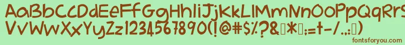 AdikkuPandaiMenari Font – Brown Fonts on Green Background