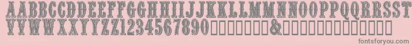 Quencrg-fontti – harmaat kirjasimet vaaleanpunaisella taustalla
