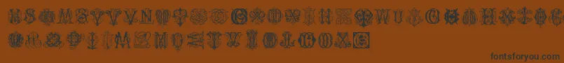 IntellectaMonogramsRandomSamplesThree Font – Black Fonts on Brown Background