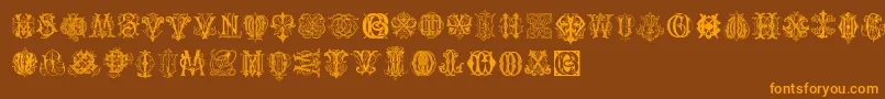 IntellectaMonogramsRandomSamplesThree Font – Orange Fonts on Brown Background