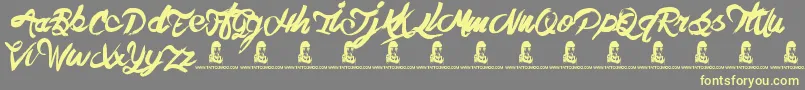 TheHit Font – Yellow Fonts on Gray Background