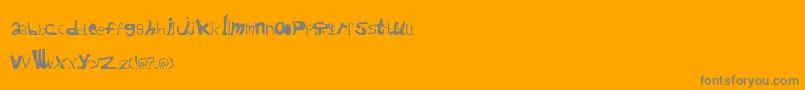 Cafeaushite-Schriftart – Graue Schriften auf orangefarbenem Hintergrund