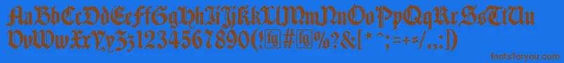 Czcionka Traditio – brązowe czcionki na niebieskim tle