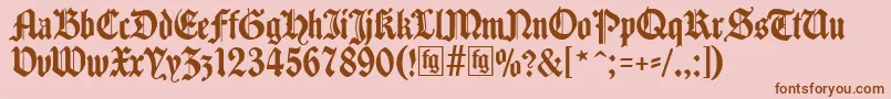 Шрифт Traditio – коричневые шрифты на розовом фоне