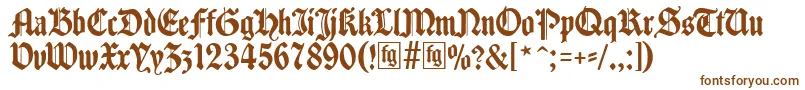 Traditio-fontti – ruskeat fontit valkoisella taustalla