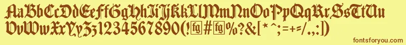 Traditio-fontti – ruskeat fontit keltaisella taustalla