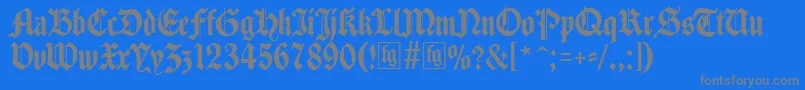 Traditio-fontti – harmaat kirjasimet sinisellä taustalla
