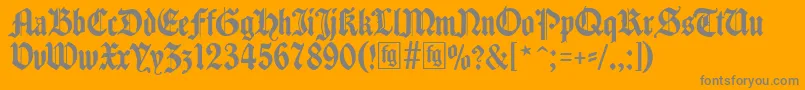 Traditio-Schriftart – Graue Schriften auf orangefarbenem Hintergrund