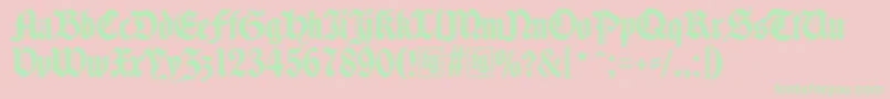 フォントTraditio – ピンクの背景に緑の文字