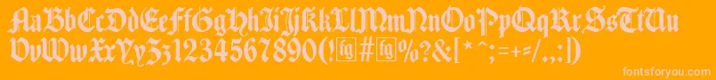 Traditio-fontti – vaaleanpunaiset fontit oranssilla taustalla
