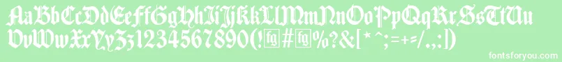 フォントTraditio – 緑の背景に白い文字