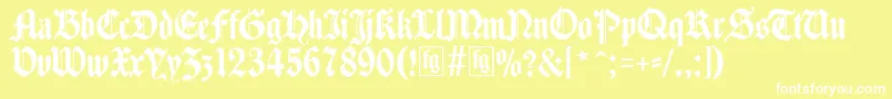 フォントTraditio – 黄色い背景に白い文字