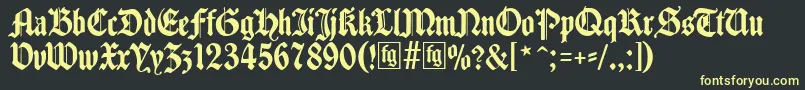 フォントTraditio – 黒い背景に黄色の文字