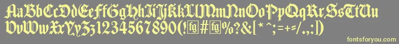 Traditio-fontti – keltaiset fontit harmaalla taustalla