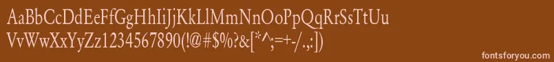 YearlindNormalCondensed-fontti – vaaleanpunaiset fontit ruskealla taustalla