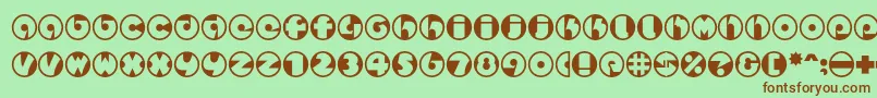 フォントSpslcirclestwoc – 緑の背景に茶色のフォント