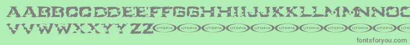 フォントIkart ffy – 緑の背景に灰色の文字