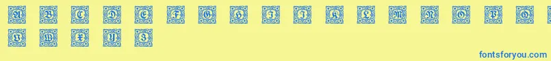 Schmuckinitialen1 Font – Blue Fonts on Yellow Background