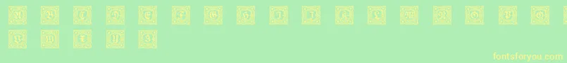 Schmuckinitialen1-Schriftart – Gelbe Schriften auf grünem Hintergrund