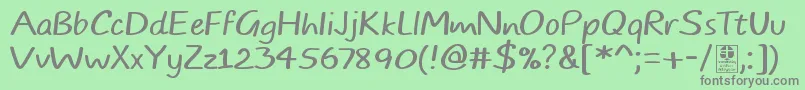 TypoComicsLightDemo-Schriftart – Graue Schriften auf grünem Hintergrund