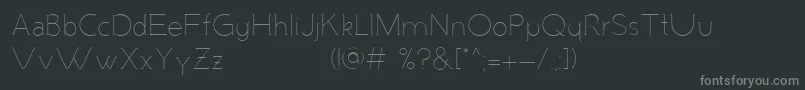 MalandrinoLight-fontti – harmaat kirjasimet mustalla taustalla