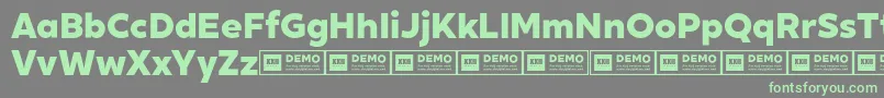 Шрифт XxiigeomdemoHeavy – зелёные шрифты на сером фоне