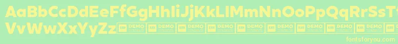 Czcionka XxiigeomdemoHeavy – żółte czcionki na zielonym tle