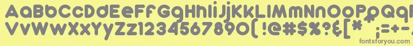 DunkinSans-fontti – harmaat kirjasimet keltaisella taustalla