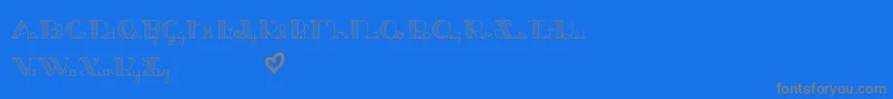 JackAndTheBeanstalkLine-Schriftart – Graue Schriften auf blauem Hintergrund