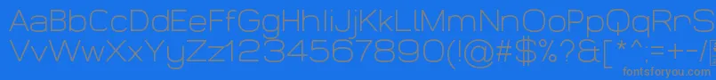 フォントWidolteLightDemo – 青い背景に灰色の文字