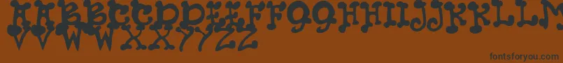 JmhPetsCaps Font – Black Fonts on Brown Background