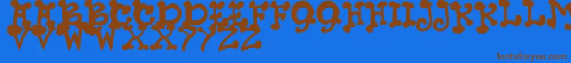 JmhPetsCaps Font – Brown Fonts on Blue Background