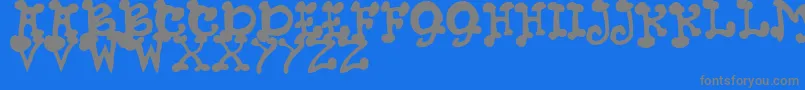 JmhPetsCaps Font – Gray Fonts on Blue Background