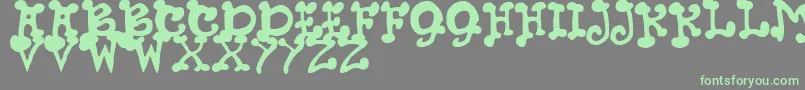 JmhPetsCaps Font – Green Fonts on Gray Background