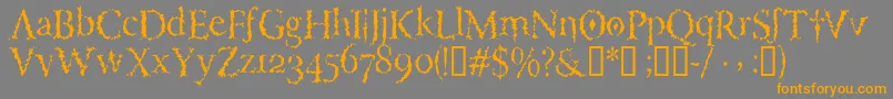 Porcupineroman-Schriftart – Orangefarbene Schriften auf grauem Hintergrund