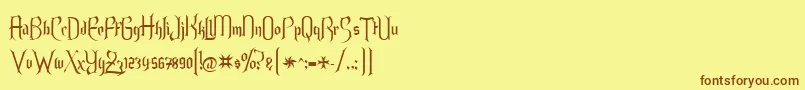 フォントEndoralt – 茶色の文字が黄色の背景にあります。