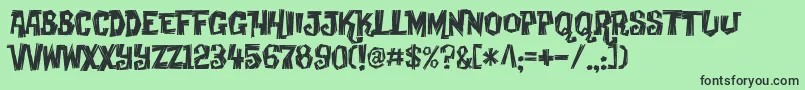 Creaky Font – Black Fonts on Green Background