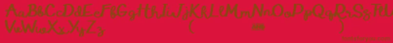 Шрифт EduardoAureliaDemo – коричневые шрифты на красном фоне