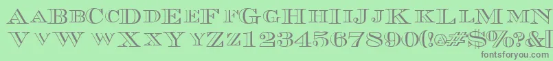 Więcej informacji o czcionce TriboutlinescapssskRegular Czcionka TriboutlinescapssskRegular – szare czcionki na zielonym tle