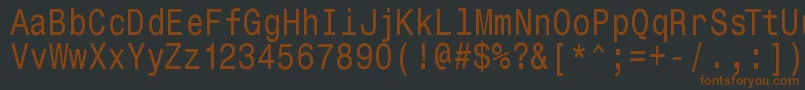 Monospacetypewriter-fontti – ruskeat fontit mustalla taustalla