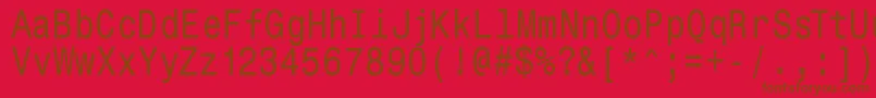 Monospacetypewriter-Schriftart – Braune Schriften auf rotem Hintergrund