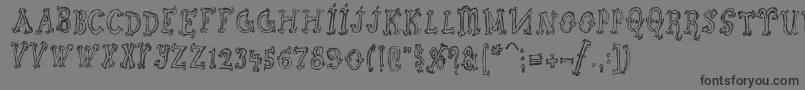 Szorakatenusz-Schriftart – Schwarze Schriften auf grauem Hintergrund