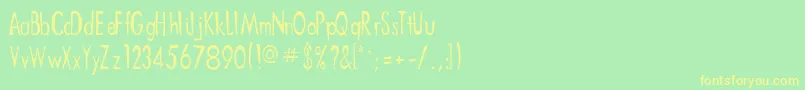 フォントDitnees – 黄色の文字が緑の背景にあります