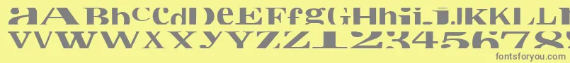 フォントCropfontxtra – 黄色の背景に灰色の文字