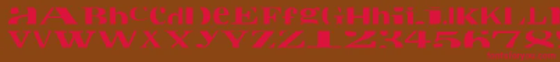 フォントCropfontxtra – 赤い文字が茶色の背景にあります。