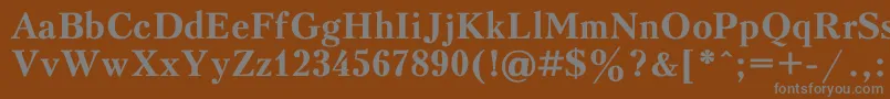 Peterbu1-fontti – harmaat kirjasimet ruskealla taustalla