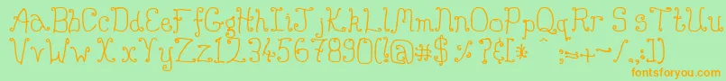 Buttmunch Font – Orange Fonts on Green Background